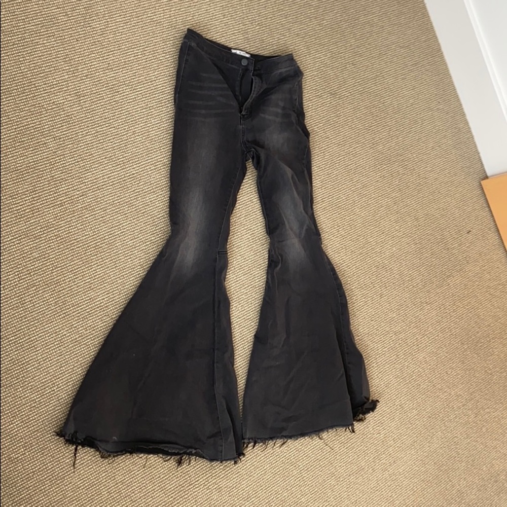 Fringed bell-bottom jeans